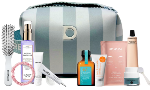 Dermstore The Jet Set Edit travel beauty bag with products