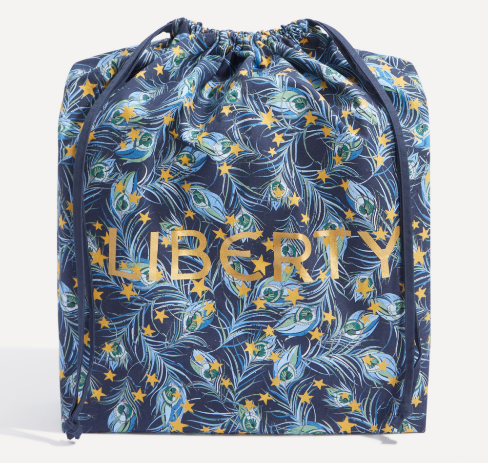 Liberty print large drawstring bag in festive plume for the beauty advent calendar 2026